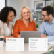 Consultant working with recruitment clients while reviewing candidate pipeline, onboarding and AI workflow dashboards.