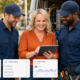 Consultant working with field service clients beside CRM dashboards showing jobs, invoices, inventory, Claude, Zoho Zia and Retell AI activity.